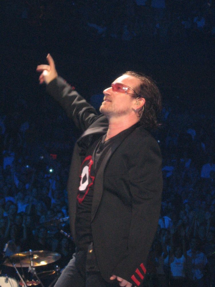 Bono showing the peace sign