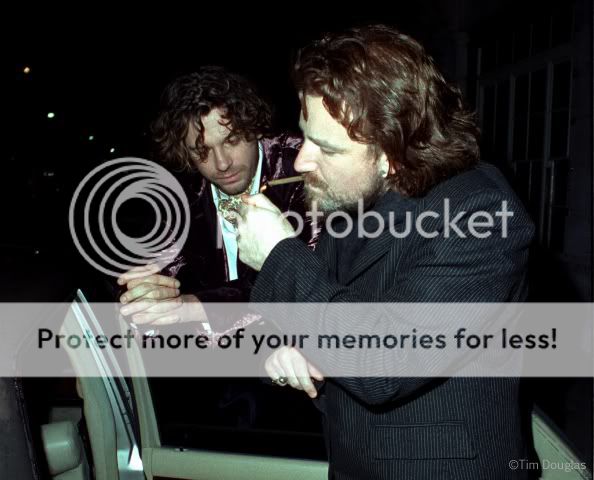 Bono-MichaelHutchence-SonyChristmasParty-HamiltonsGallery-Mayfair-London-19Dec1994copyTimDouglas-CameraPressLondon2wm.jpg~original