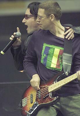 adam and bono elevation hug.jpg