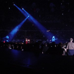 Edge, Bono with Bill Walton in foreground