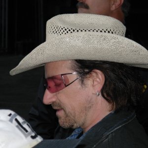 Bono signing autographs