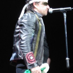 Bono is still clutching the flag given to him