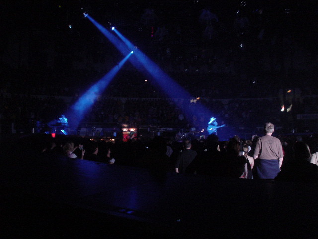 Bono and Edge..plus Bill Walton in foreground