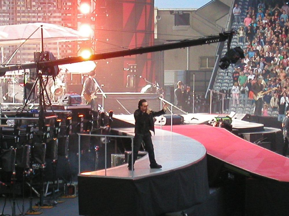 Bono stage right