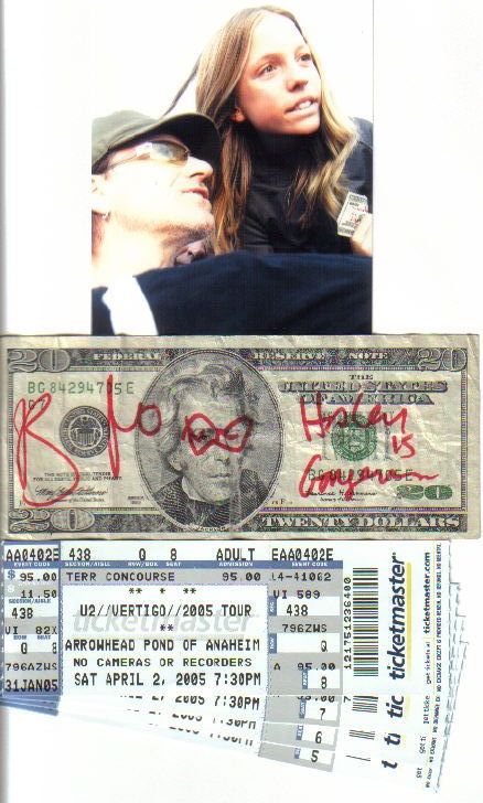 Bono with Fan, Haley Lewis, and autograph