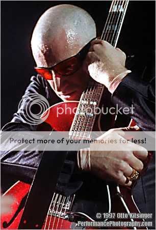 baldyredguitarhug.jpg