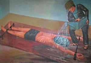 Waterboarding-in-Cambodia-during-the-Khmer-Rouge-regime.-Painting-by-former-prison-inmate-Vann-Nath-at-the-Tuol-Sleng-Genocide-MuseumWaterboard3-small-300x207.jpg